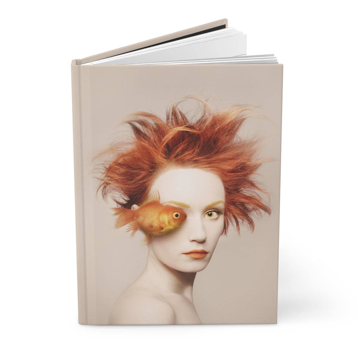 Orange fish on woman's portrait sharing eyes notebook